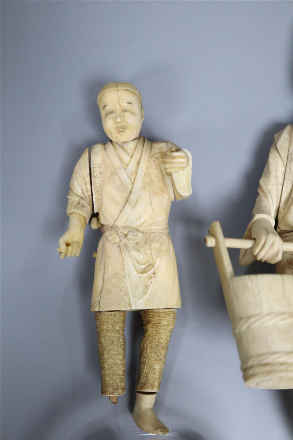 Three Japanese sectional ivory figures (a.f.), early 20th century